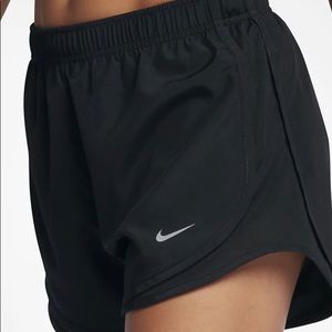 Black Nike running shorts